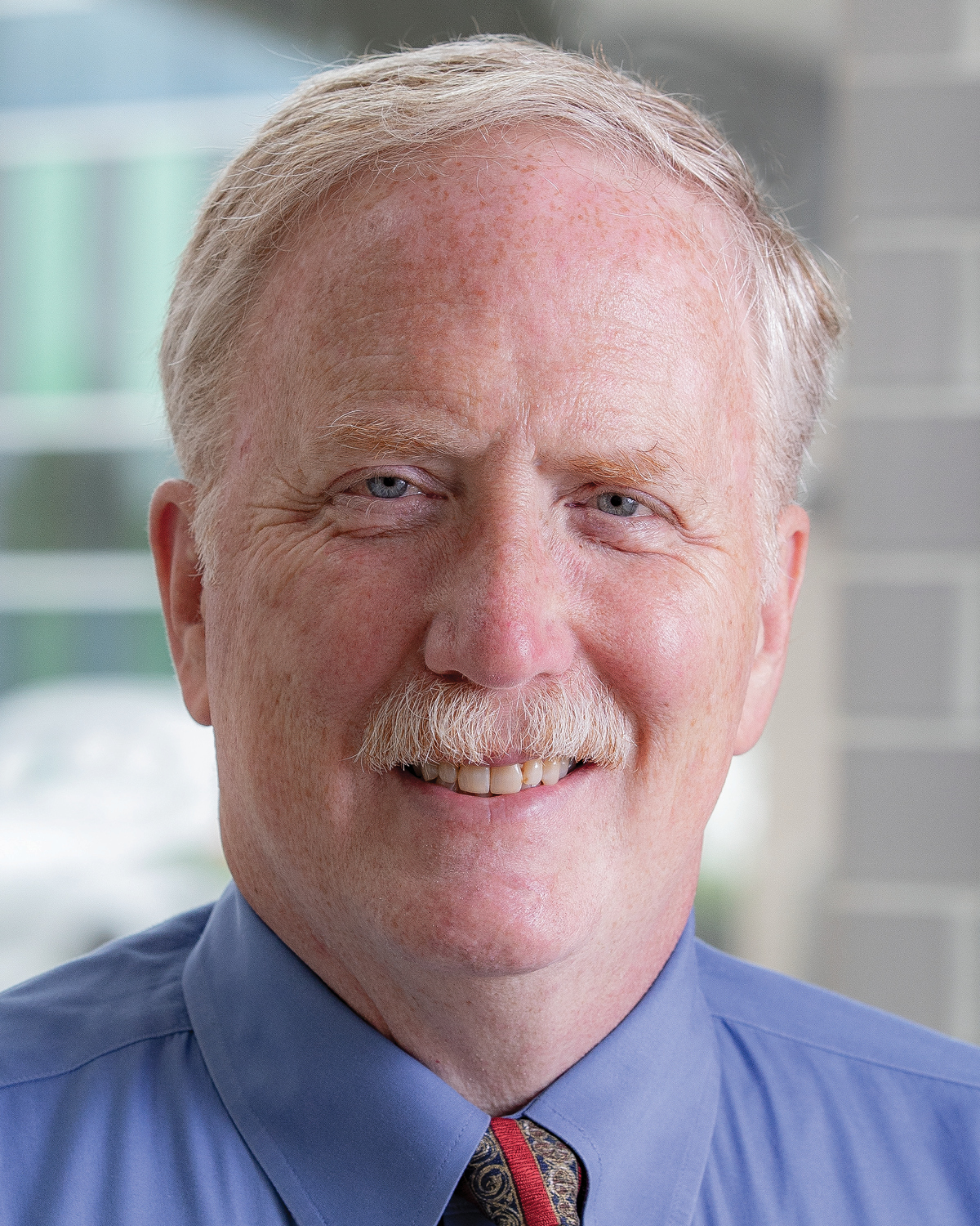 John E. Reaves, MD